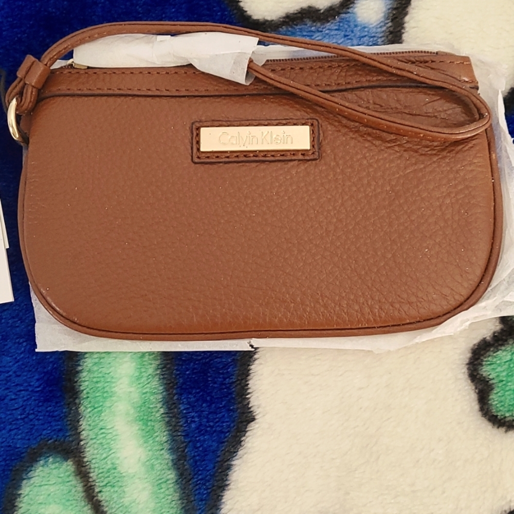 Calvin Klein small leather clutch- camel color